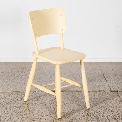 A Single Vintage Chair In White