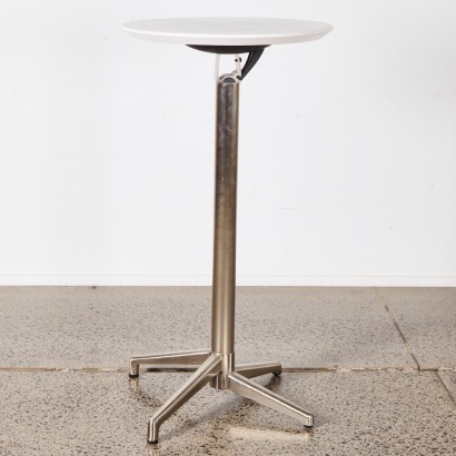 A Foldable Bar Leaner with Stainless Steel Base & White Top