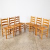 A Set Of Six Rustic Ladder Back Rush Seat Chairs