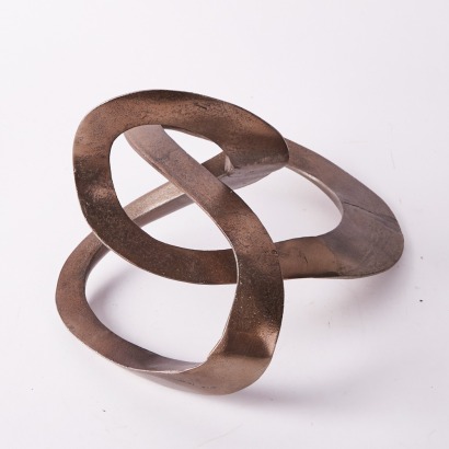 A Bronzed Metal Abstract Sculpture