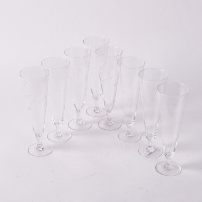 A Set of Eight Etched Glass Flutes