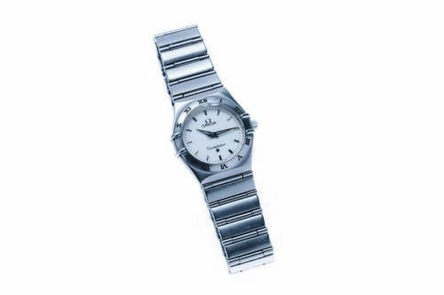 A Lady's stainless steel Constellation wristwatch, Omega. Quartz. 26mm. Ref: 15723000. Cal.1456. Cream dial, applied baton numerals, case, dial, movement and bracelet signed. Box and papers.