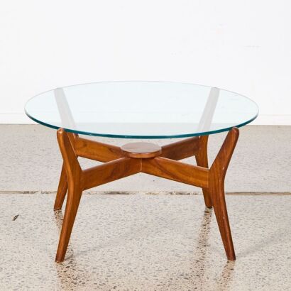 A Teak and Glass Topped Coffee Table