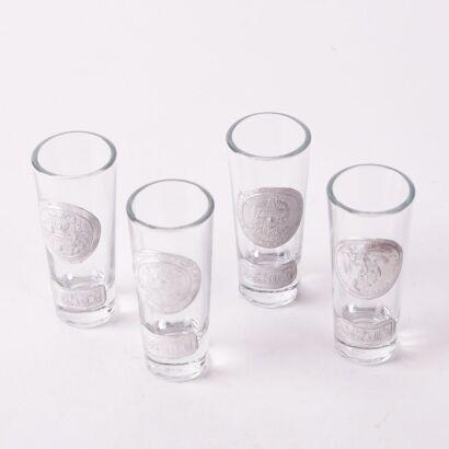 A Set Of Four Mexican Tequila Shot Glasses