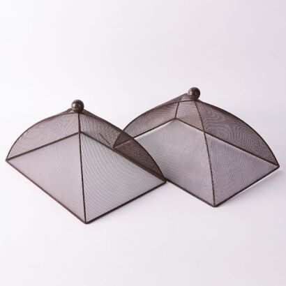 A Pair Of Metal Food Covers