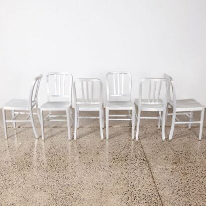 A Set of Six Emeco 1006 Navy Style Chairs