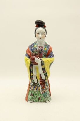 A Chinese Jingdezhen Famille-rose 'Lady with flowers' Ornament