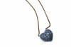 A diamond pendant, the pave diamond set heart-shaped pendant suspended from an extendable Italian gold chain. Estimated total diamond weight 0.42 carat. 9ct yellow and white gold. Weight 5.3grams. Length 50cm.