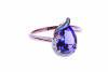 An amethyst and diamond ring, the pear-shaped amethyst in diamond set surround. 9ct rose gold. Weight 3.6 grams. Size P.&nbsp;