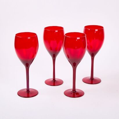 A Set Of Four Red Art Glass Wine Glasses