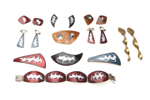 A collection of Danish copper and enamel jewellery including brooches, bracelet and earrings.