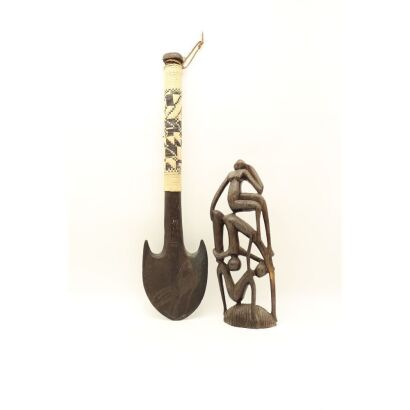 A Carved Wooden Shovel Hanging and A Carved Wooden 'Dancing Figure' Ornament