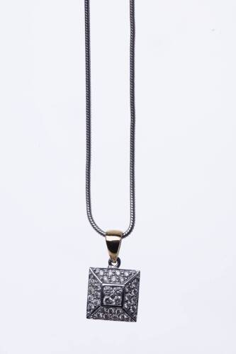 A diamond pendant on chain, of square design and hung on a fine snake link chain. 9ct white gold. Weight 7.29 grams. Length 42mm.
