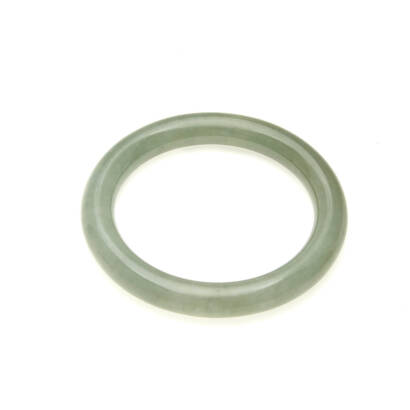 A jade bangle, of plain polished design. Inside diameter 8cms. 