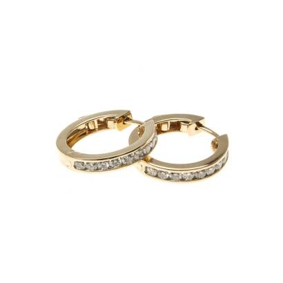 A pair of diamond hoop earrings, the front section channel set with round brilliant cut diamonds of known total weight 1.04 carats. 9ct yellow gold. Weight 5.46 grams. Diameter 20mm. 