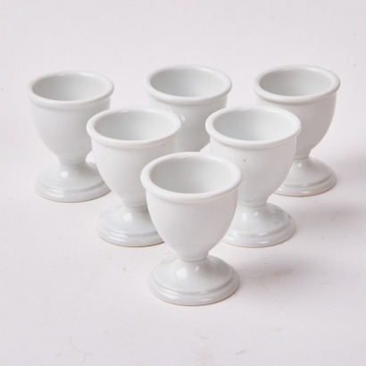 A Set Of Six Pillivuyt Egg Holders Made in France