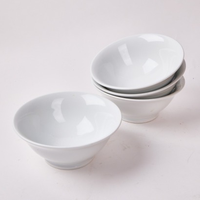 A Set Four Pilivuyt Salad Bowls Made in France