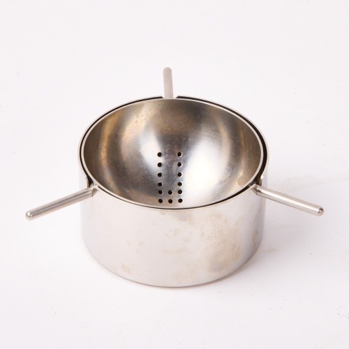 A Stelton Cylinda Line Tea Strainer. Made in Denmark