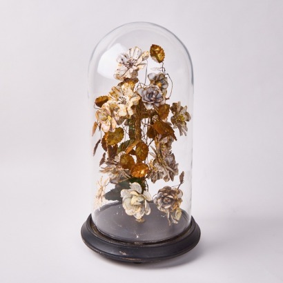 A Glass Dome with Rustic Metal Floral Arrangement