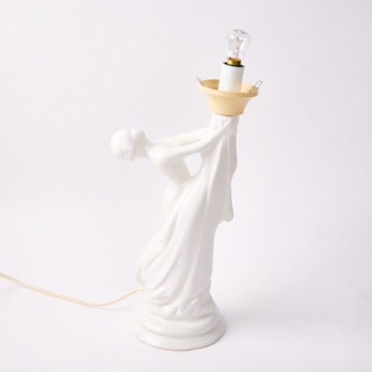 A Figural Porcelain Lamp