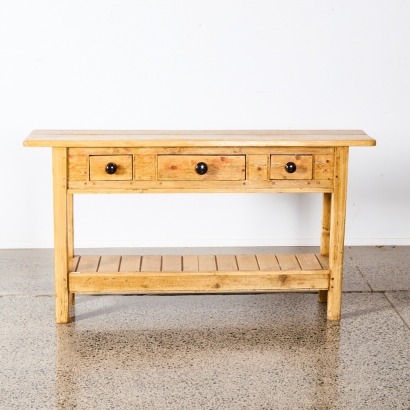 A Rustic Three Drawer Console Table