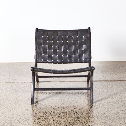 A Leather Lattice Lounge Chair With Ebonised Frame