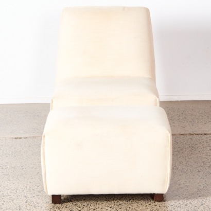 A Lowline Occasional Lounge Chair with Ottoman