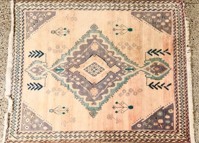 A Hand Knotted Persian Rug