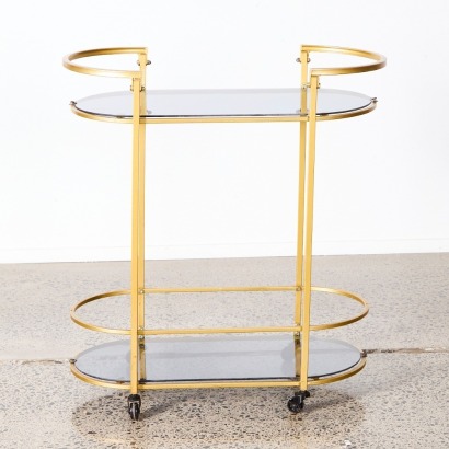 A Vintage Metal Drinks Trolley With Glass Shelves