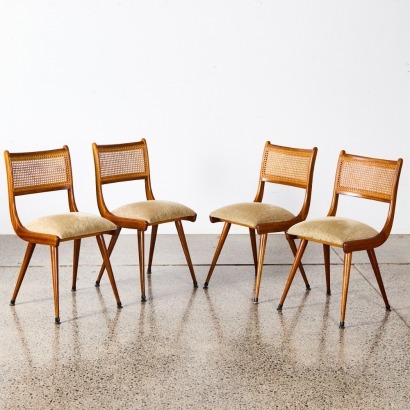 A Set Of Four Jon Jansen Rattan Backed Mid-Century Dining Chairs