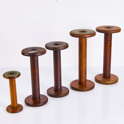 A Collection Of Antique Wooden Bobbins