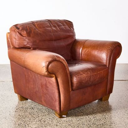 A Brown Leather Single Lounge Chair