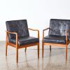 A Pair of Elegant Mid-Century Teak Armchairs by Airest