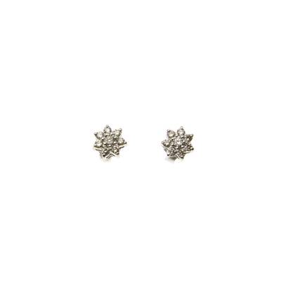 A pair of diamond stud earrings, of star design. Known diamond weight 0.28 carat. 9ct white gold. Weight 1.24 grams. Post and butterfly attachments.&nbsp;