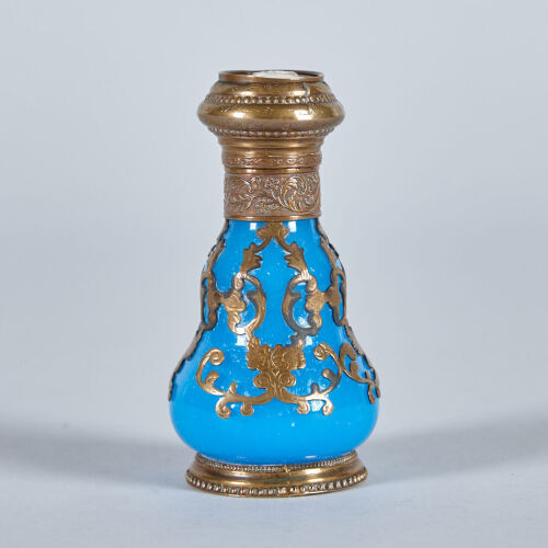 An Antique French Blue Glass Perfume Bottle with Cameo Lid