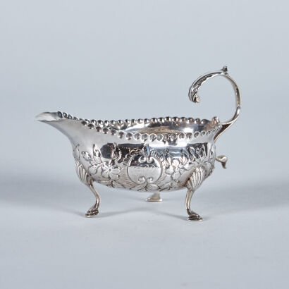 A Victorian Sterling Silver Gravy Jug