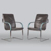 A Pair of Fabricious and Kastholm Chairs