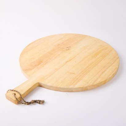 A Large Circular Applewood Serving Board