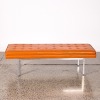 An Orange Steel Case Bench