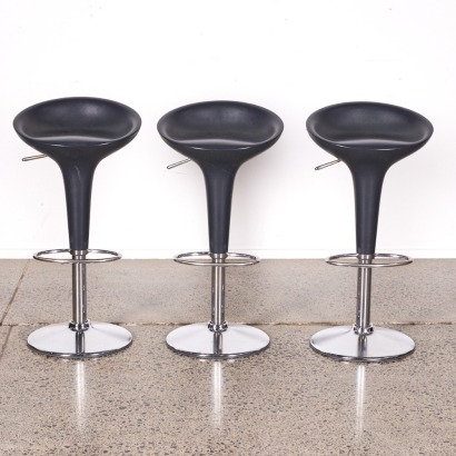 A Trio of Magis Bombo Bar Stools in Grey