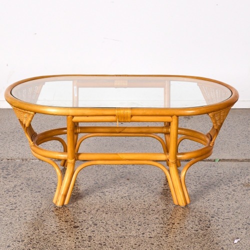 An Oval Cane Coffee Table