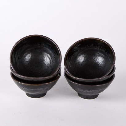 A Set of Six Japanese Pottery Black Glazed Bowls