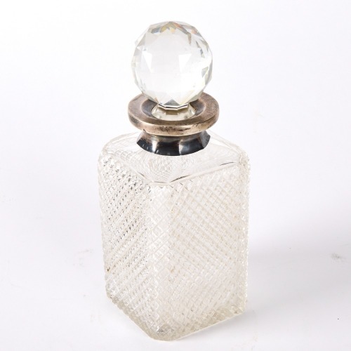 An English Decanter With A Sterling Silver Band