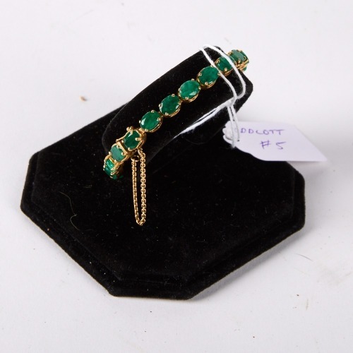 A Gold and Emerald Bracelet