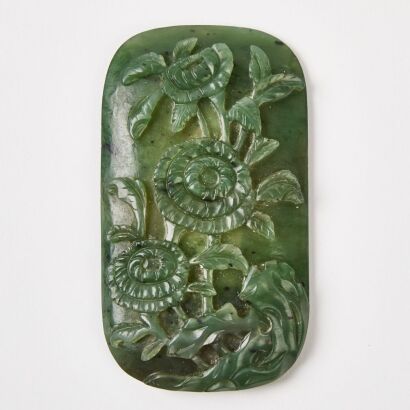 A Chinese Qing Dynasty Spinach-Green Jade 'Floral' Pendant