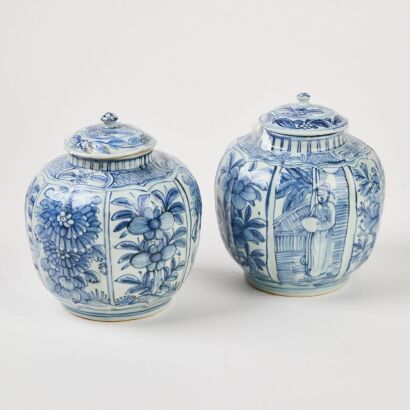 A Pair of Chinese Blue and White 'Flowers and Figures' Jars and Covers