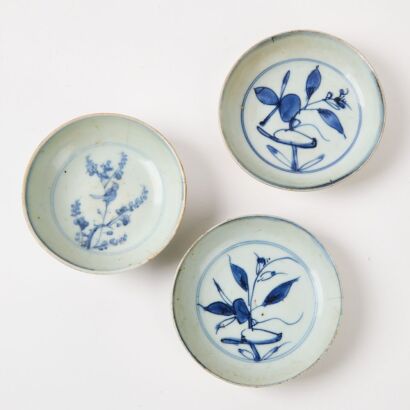 A Pair of Chinese Ming Dynasty Blue And White &lsquo;Birds And Flowers' Dishes And A Chinese Ming Dynasty Blue And White &lsquo;Birds And Flowers&rsquo; Dish