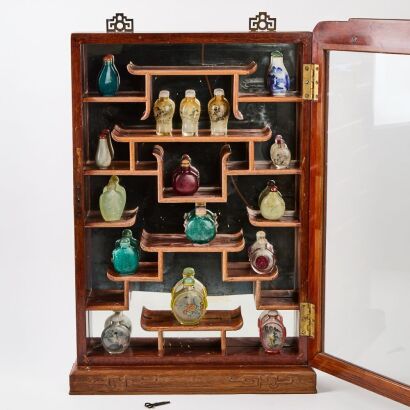 A Chinese Small Old Mahogany Bogu Cabinet and A Group Of Sixteen Snuff Bottles