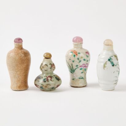 A Group Of Four Chinese Famile-Rose Snuff Bottles