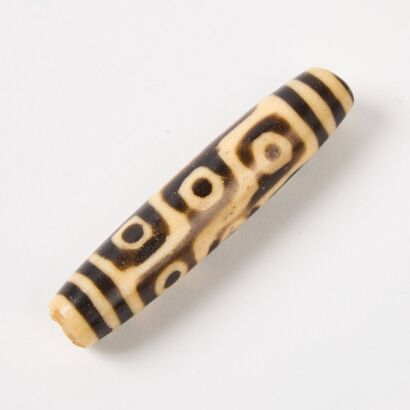 A Chinese Tibet Nine-Eyed Dzi Bead